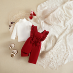 Barboteuse avec haut à col roulé et pantalon long.