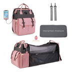 Sac à langer avec matelas intégré et accessoires